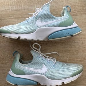 Light blue Nike shoes